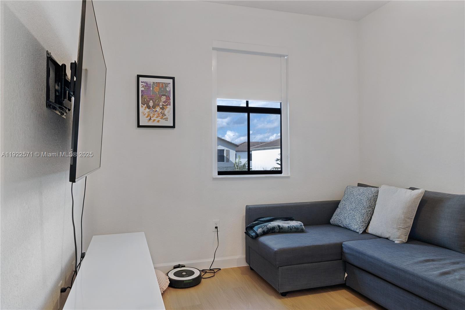 23471 Southwest 129th Path Homestead, FL 33032 - Photo 41 of 52 a living room with furniture and a couch