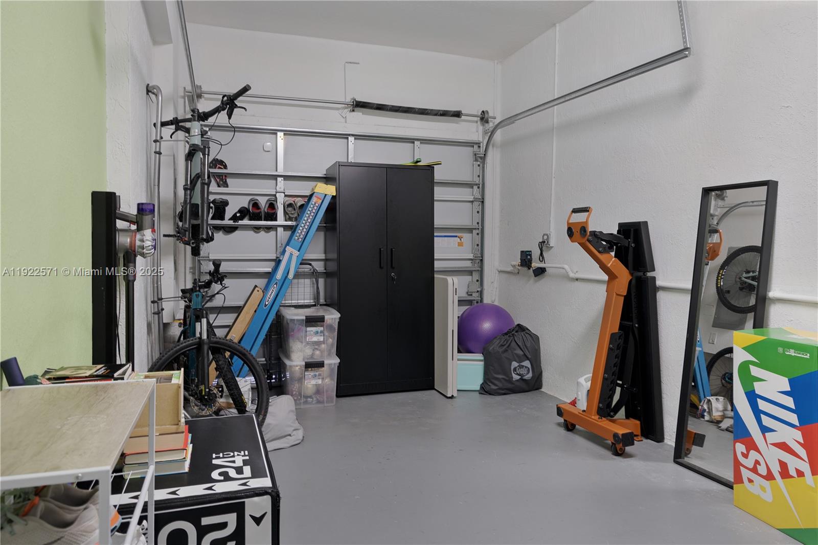 23471 Southwest 129th Path Homestead, FL 33032 - Photo 50 of 52 a view of a room with gym equipment