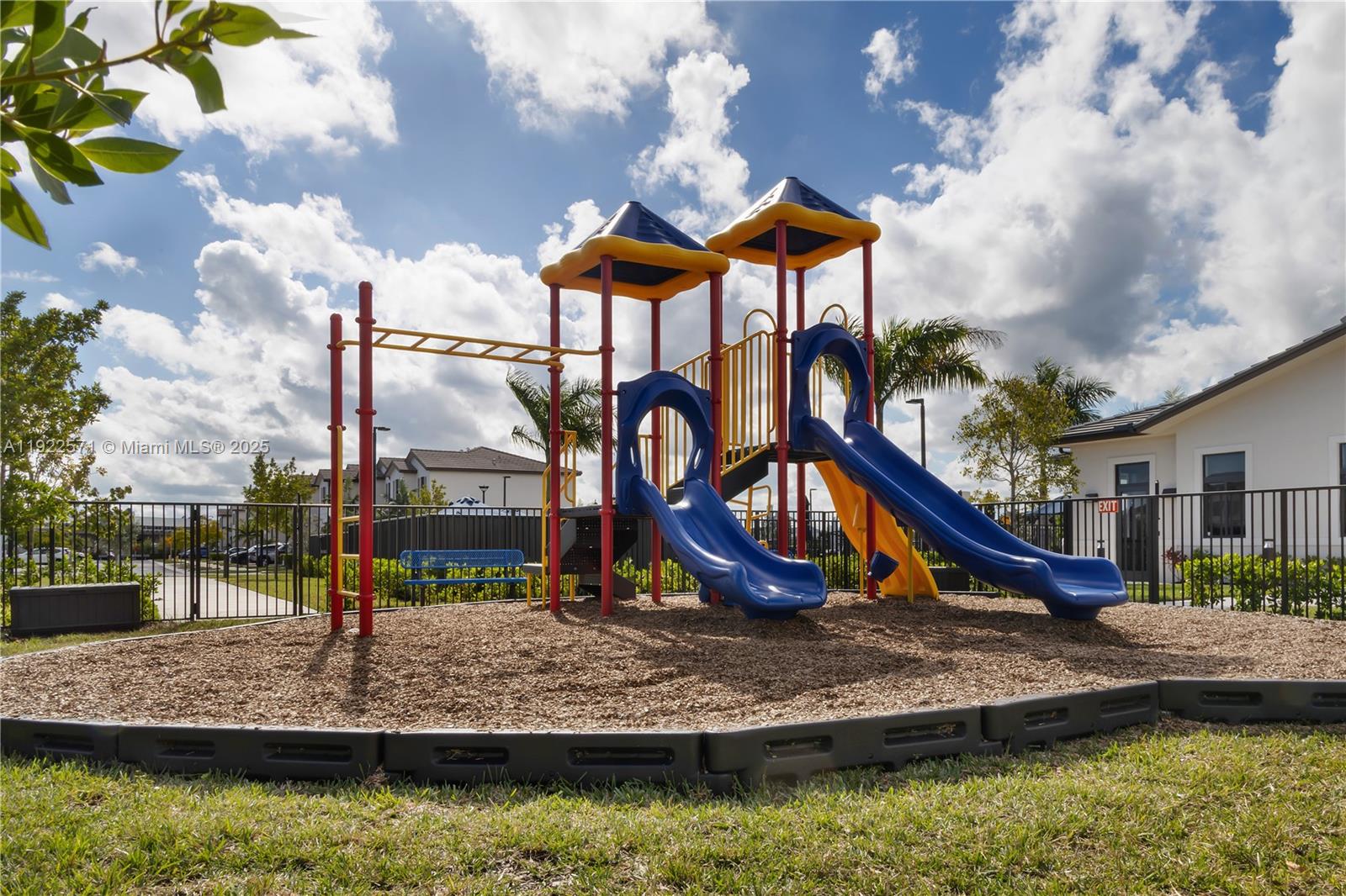 23471 Southwest 129th Path Homestead, FL 33032 - Photo 8 of 52 a view of a house with large trees in a lake