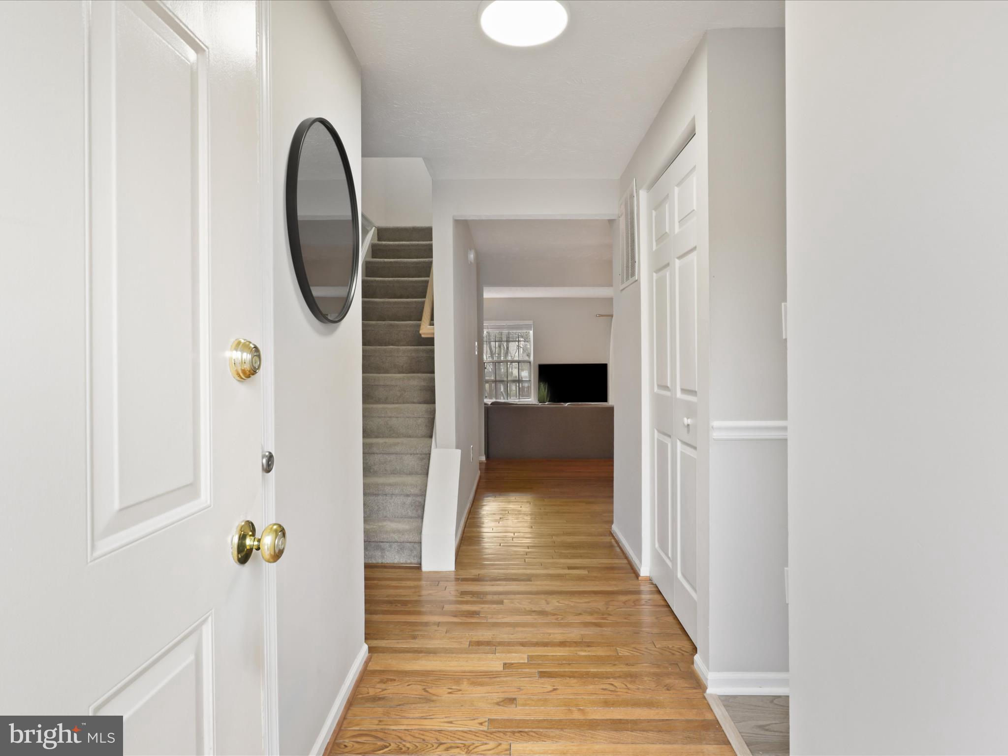 1561 Autumn Ridge Circle Reston, VA 20194 - Photo 4 of 53 Hardwood flooring begins in the foyer