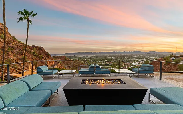 a view of city from terrace with seating space