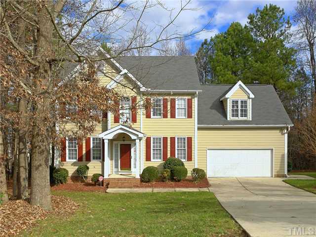 2604 Westmill Court Raleigh, NC 27613 - Photo 1 of 25 a front view of a house with a yard