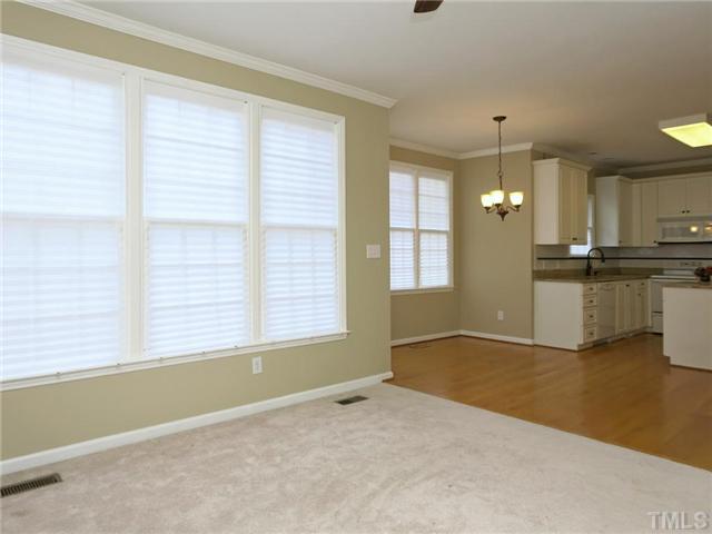 2604 Westmill Court Raleigh, NC 27613 - Photo 8 of 25 a view of an empty room with a window