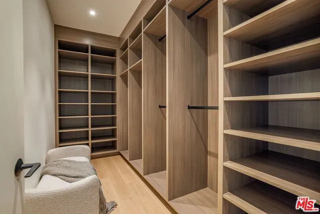 a view of an empty walk in closet