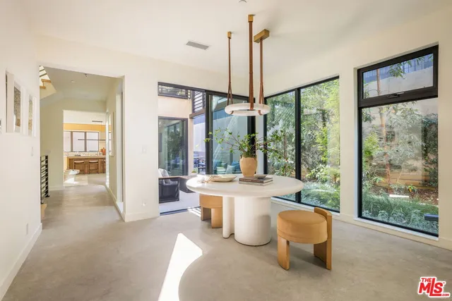 a large living room with a large window