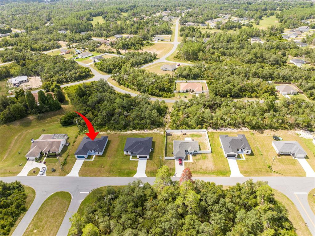 3970 Southwest 157th Place Road Ocala, FL 34473 - Photo 15 of 87 an aerial view of residential houses with outdoor space and swimming pool