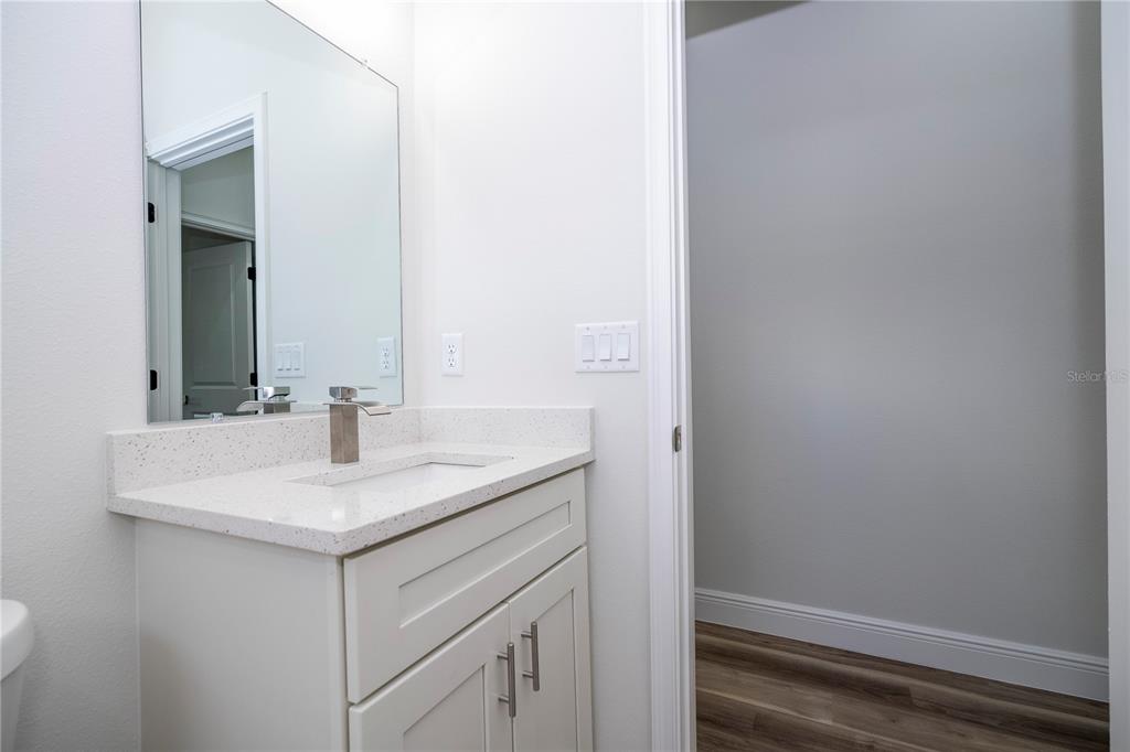 3970 Southwest 157th Place Road Ocala, FL 34473 - Photo 45 of 87 a bathroom with a sink and a mirror