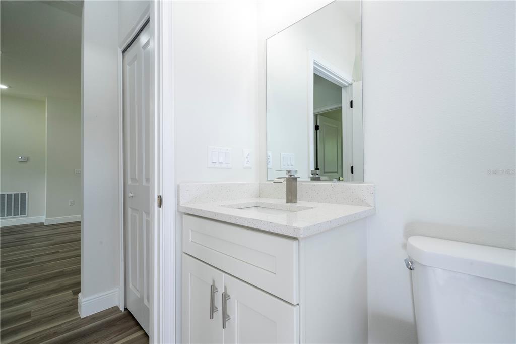 3970 Southwest 157th Place Road Ocala, FL 34473 - Photo 62 of 87 a bathroom with a sink and a toilet