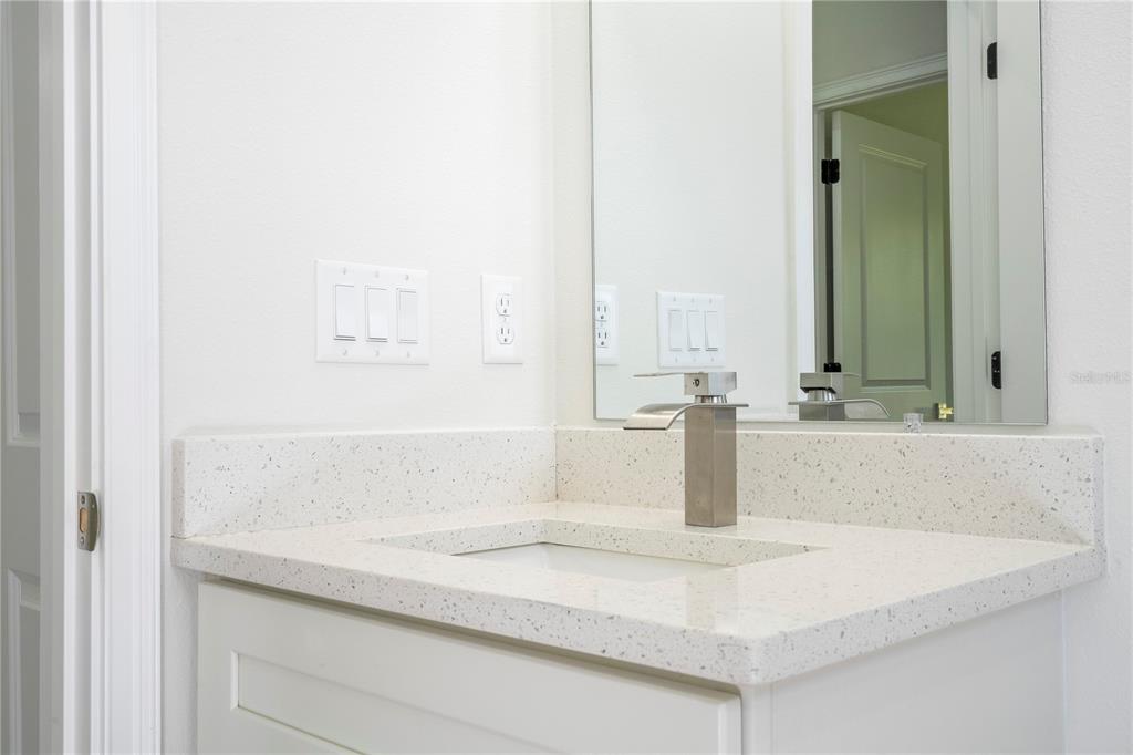3970 Southwest 157th Place Road Ocala, FL 34473 - Photo 63 of 87 a bathroom with a sink and a mirror