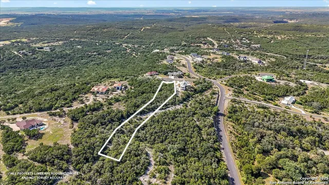 a view of a house with a tree