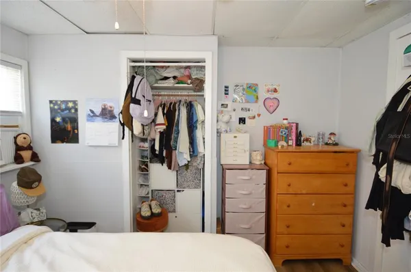 a kitchen with a refrigerator and a sink