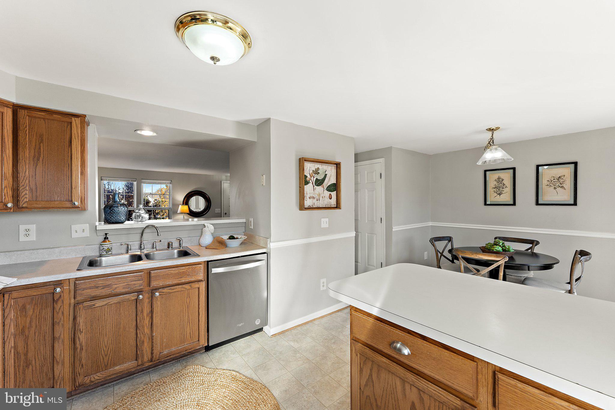 45304 Gable Square Sterling, VA 20164 - Photo 6 of 28 Open space between kitchen & living.