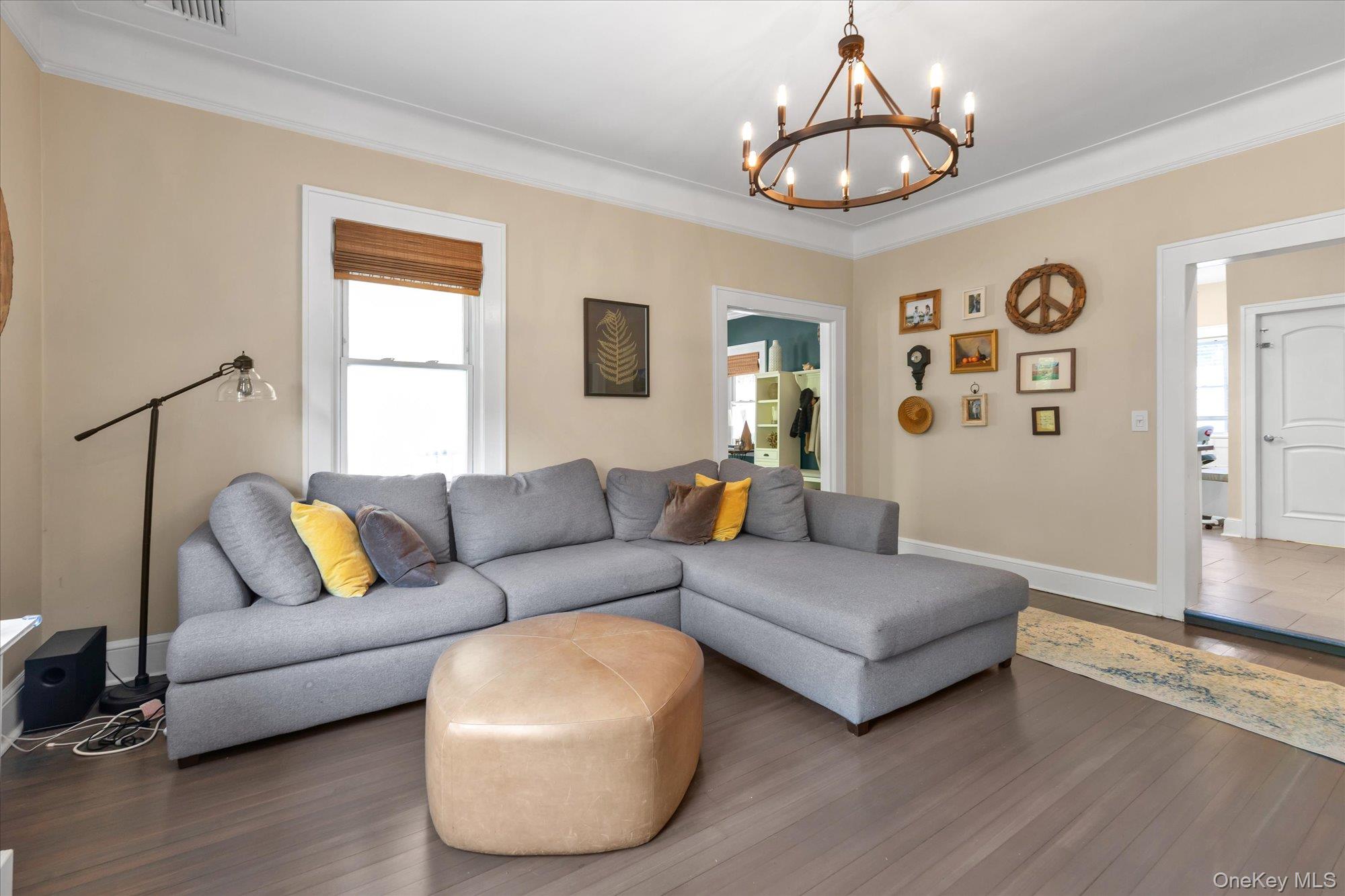 80 Skunks Misery Road Locust Valley, NY 11560 - Photo 9 of 25 a living room with furniture and a large window