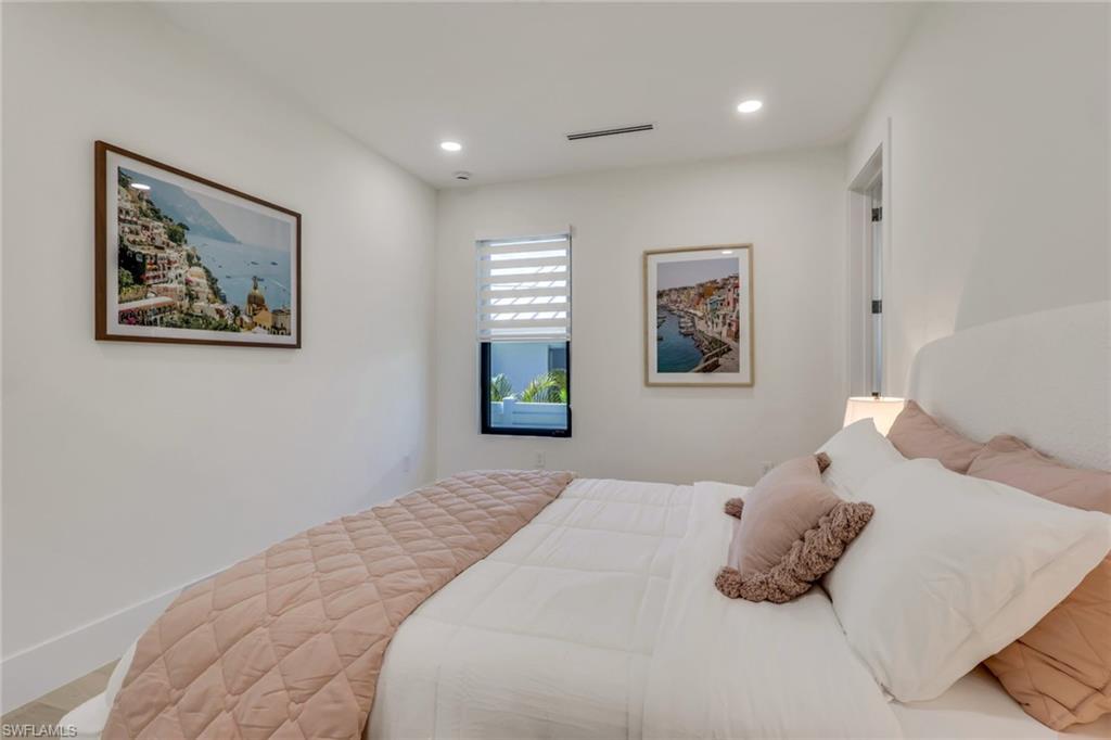 1150 8th Terrace North Naples, FL 34102 - Photo 27 of 39 Bedroom with recessed lighting and baseboards