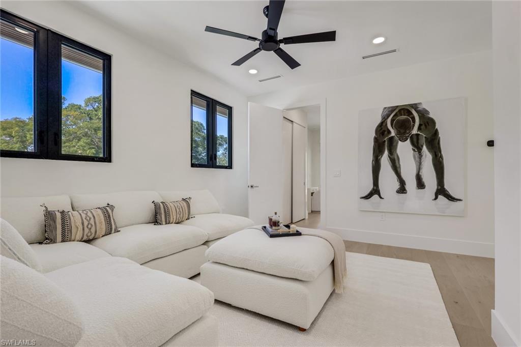 1150 8th Terrace North Naples, FL 34102 - Photo 33 of 39 Living room featuring wood finished floors, a ceiling fan, and recessed lighting
