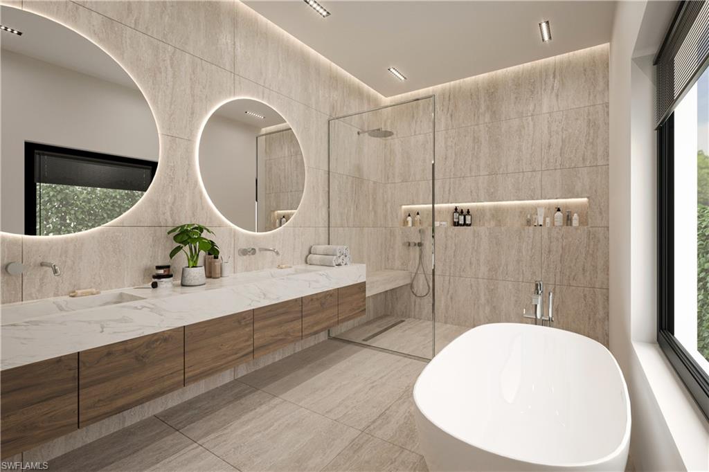 1150 8th Terrace North Naples, FL 34102 - Photo 5 of 6 a bathroom with a double vanity sink and a mirror