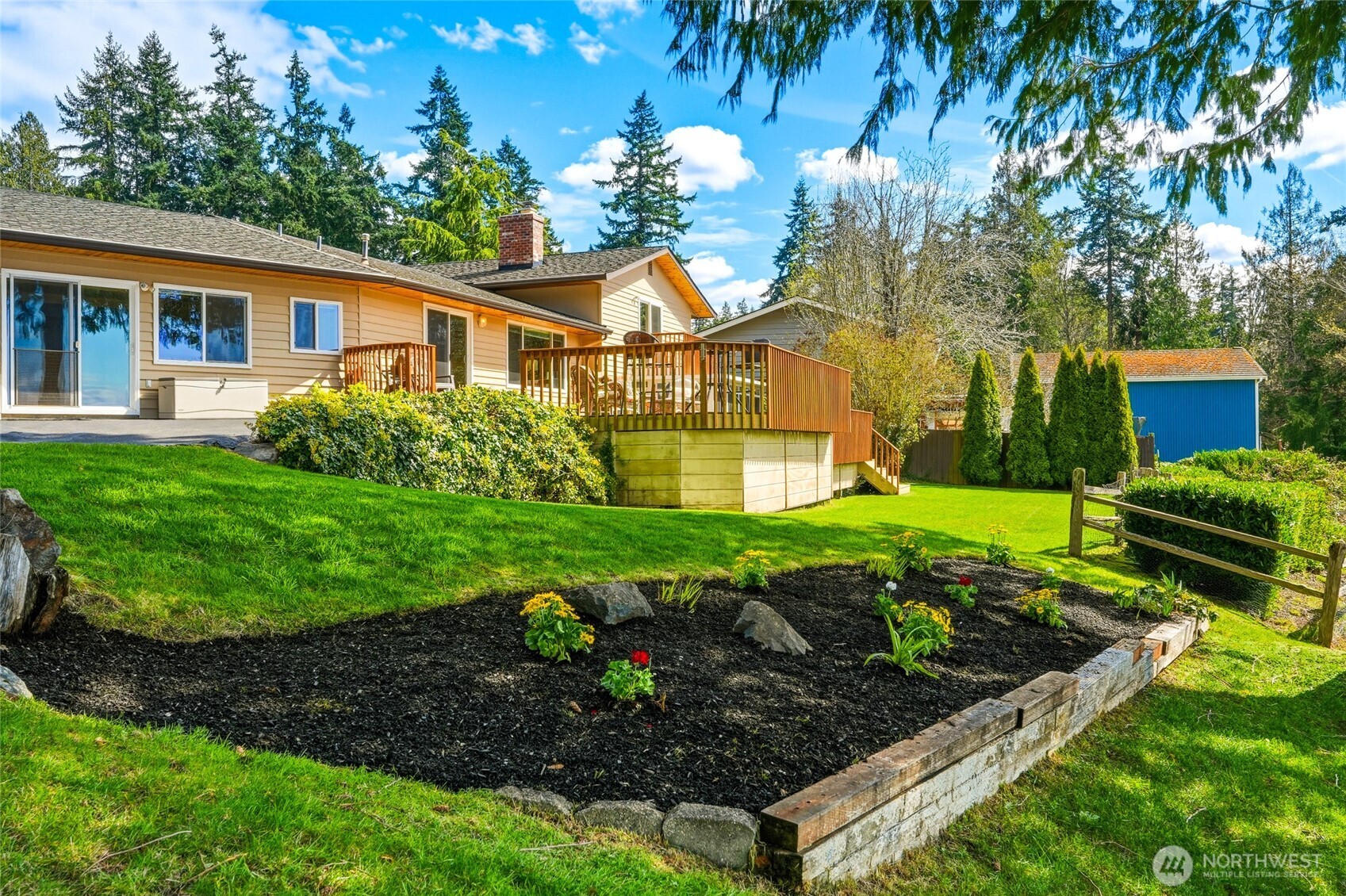 8910 56th Place West Mukilteo, WA 98275 - Photo 33 of 40 a front view of a house with a yard