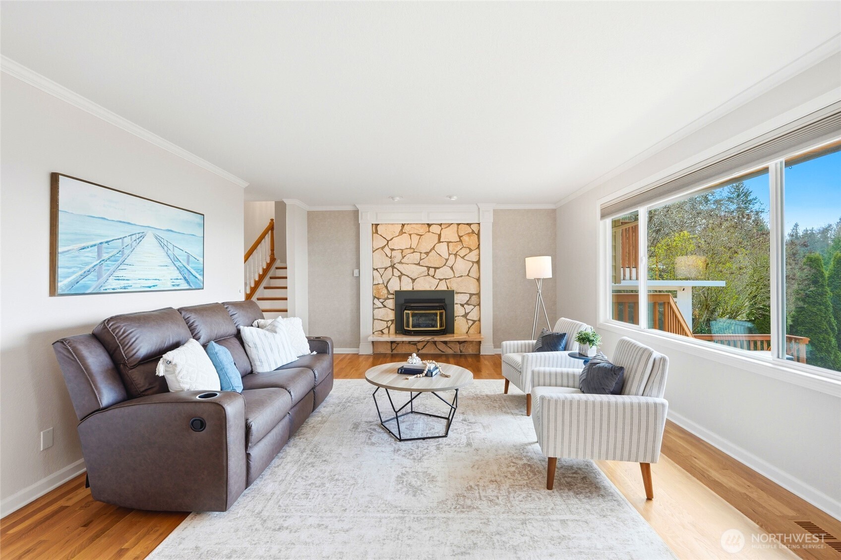 8910 56th Place West Mukilteo, WA 98275 - Photo 7 of 40 a living room with furniture and a large window