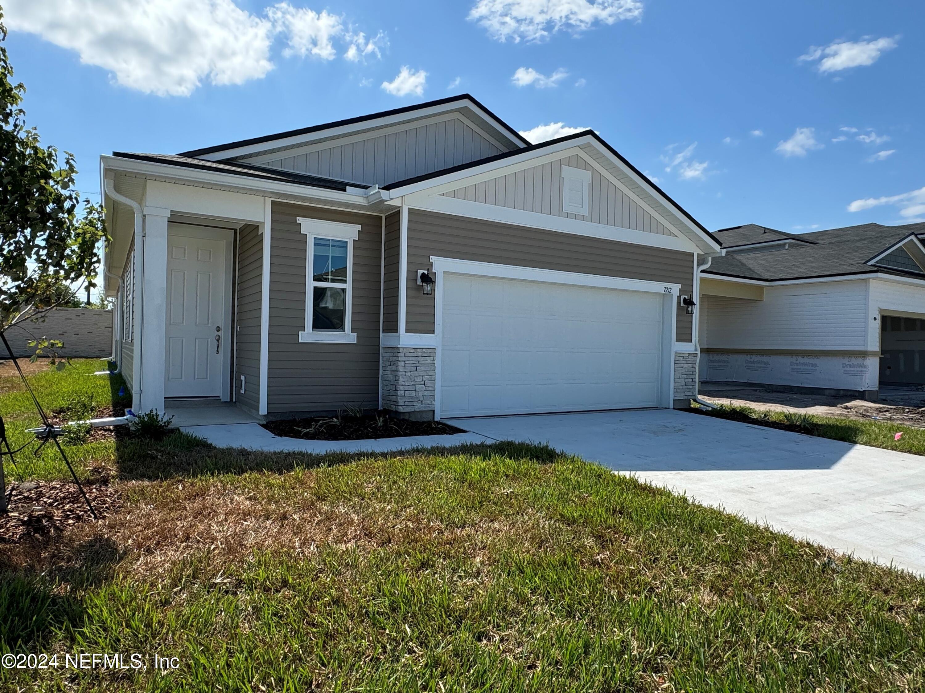 7212 Red Timber Road Jacksonville, FL 32244 - Photo 21 of 21 a front view of house with yard outdoor seating and barbeque