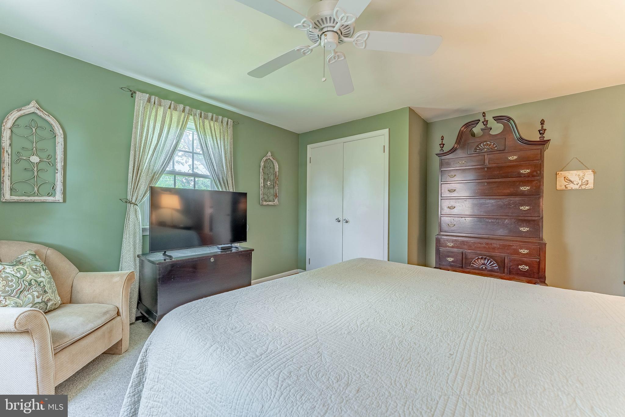 84 North Spring Lane Phoenixville, PA 19460 - Photo 36 of 51 a bedroom with a bed and a flat screen tv