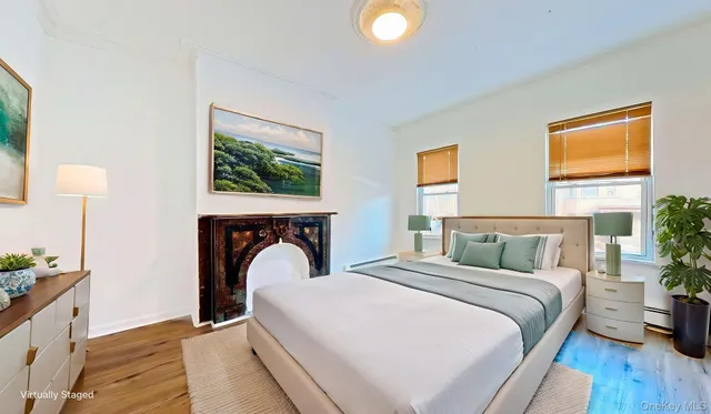 a bed room with a bed and a chair