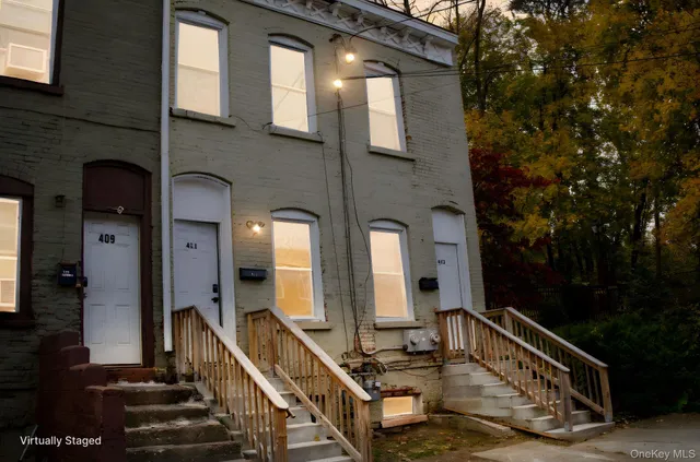 a view of a balcony with chairs