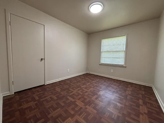 an empty room with windows
