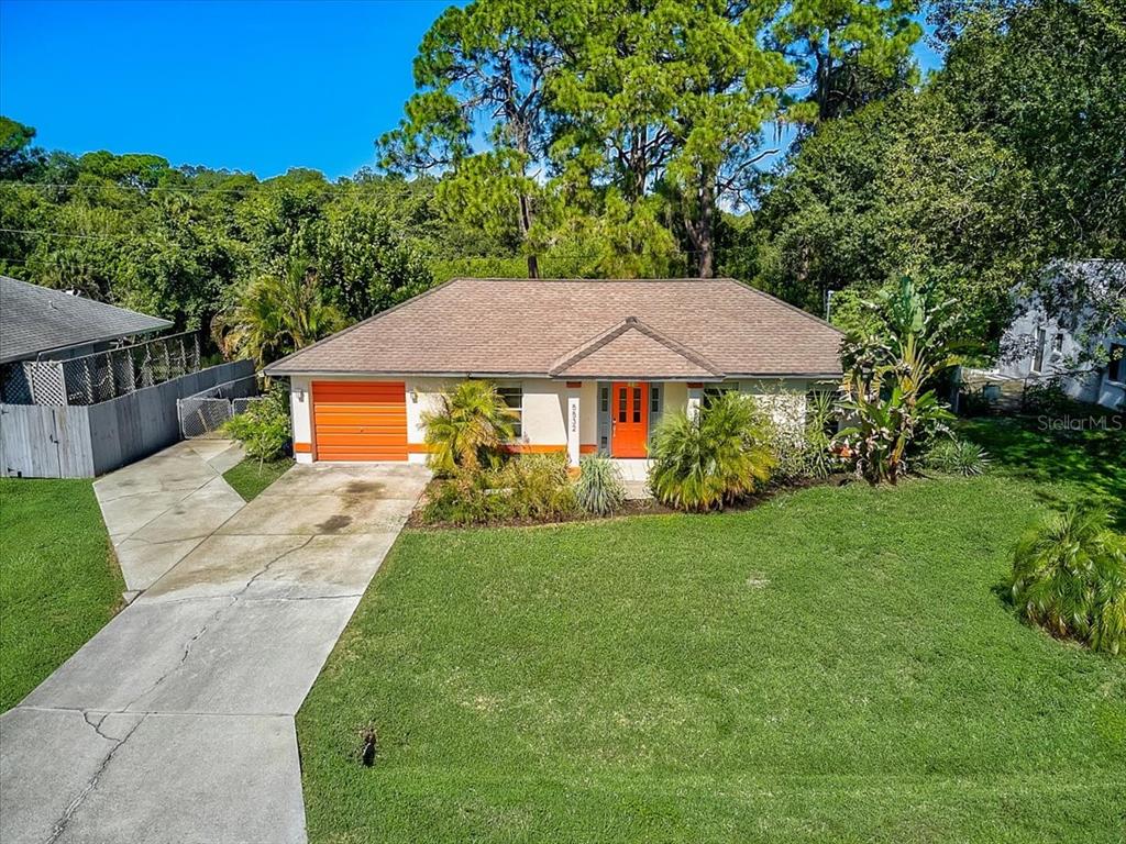 5532 Rice Road Venice, FL 34293 - Photo 1 of 1 a view of a house with a yard and sitting area