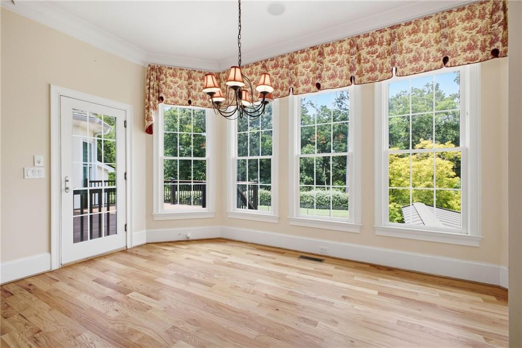 5 St Andrews Way Rome, GA 30165 - Photo 25 of 75 a view of an empty room with a window and wooden floor