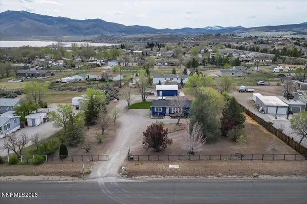 an aerial view of a house with a garden