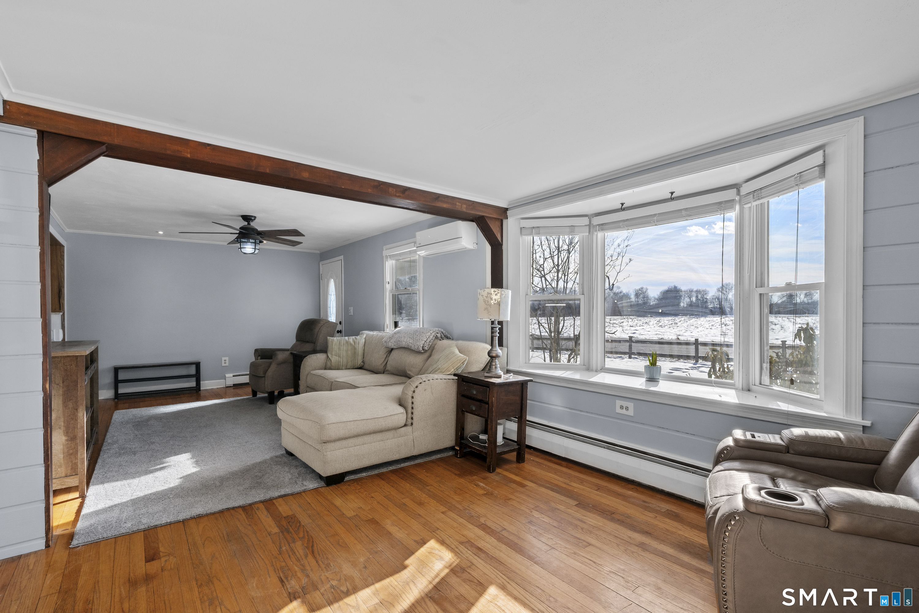 420 Halladay Avenue West Suffield, CT 06078 - Photo 14 of 32 Expansive living room with cozy pellet stove.