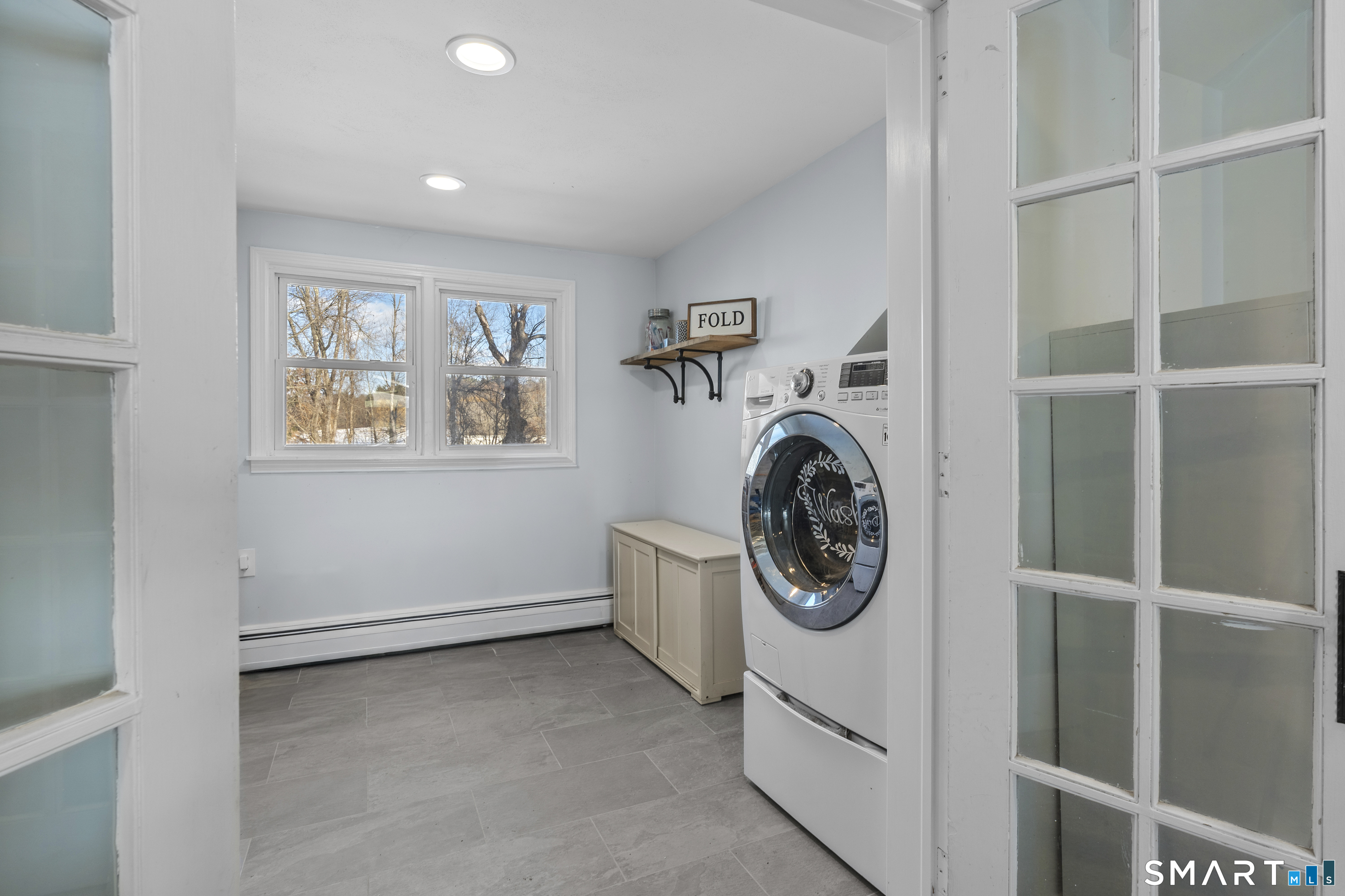 420 Halladay Avenue West Suffield, CT 06078 - Photo 23 of 32 Convenient second floor laundry room complete with set tub.