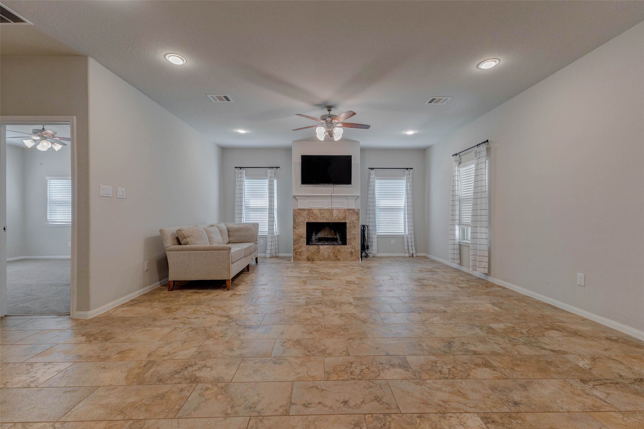 3811 Springcrest Lane Montgomery, TX 77356 - Photo 6 of 23 a living room with furniture and a fireplace