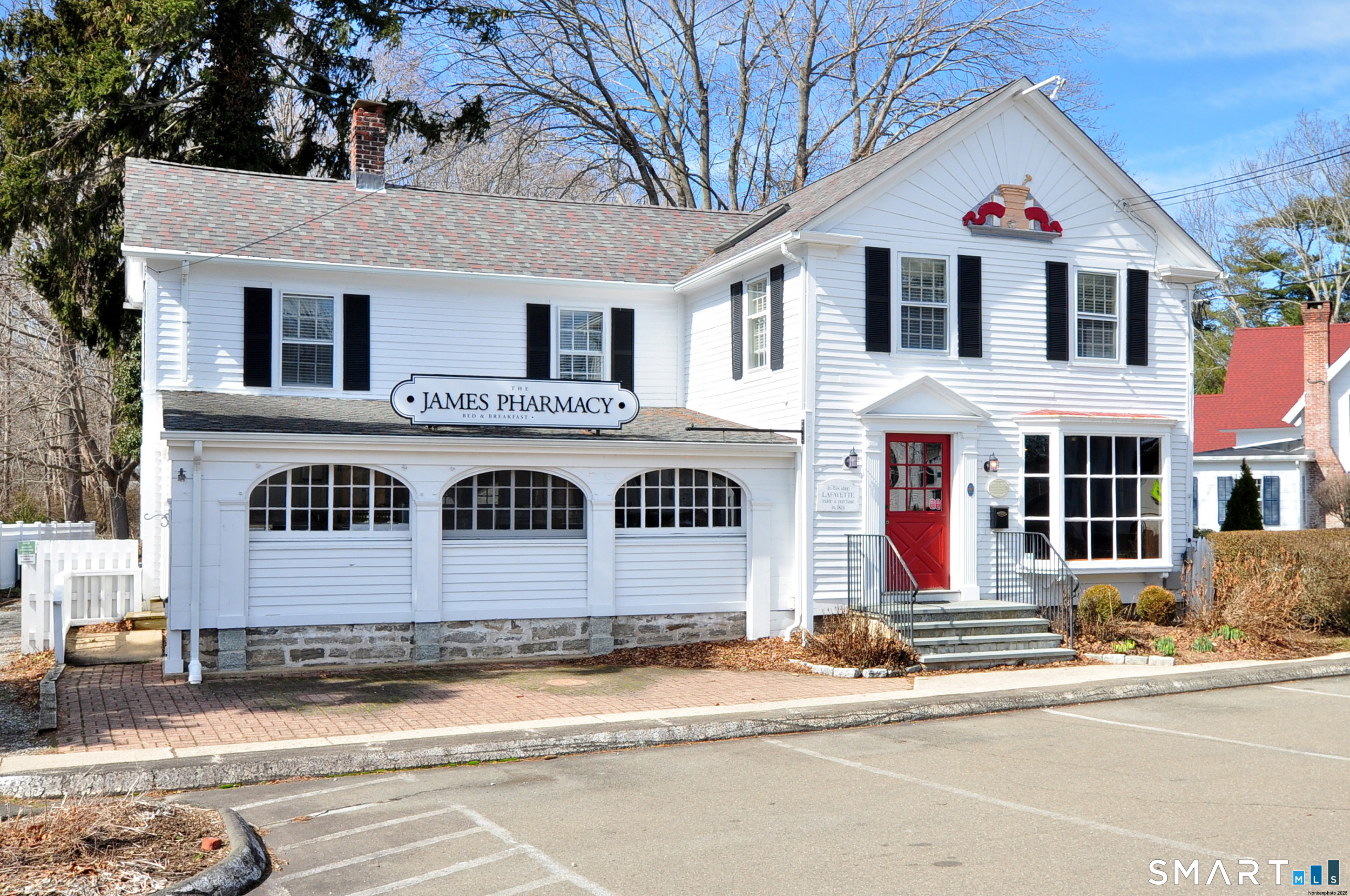 323 Main Street Old Saybrook, CT 06475 - Photo 1 of 1 a front view of residential houses