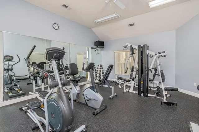 a view of a room with gym equipment