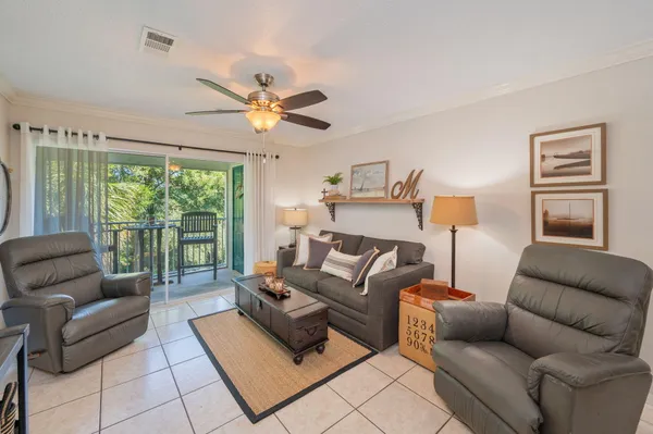 a living room with furniture and a window