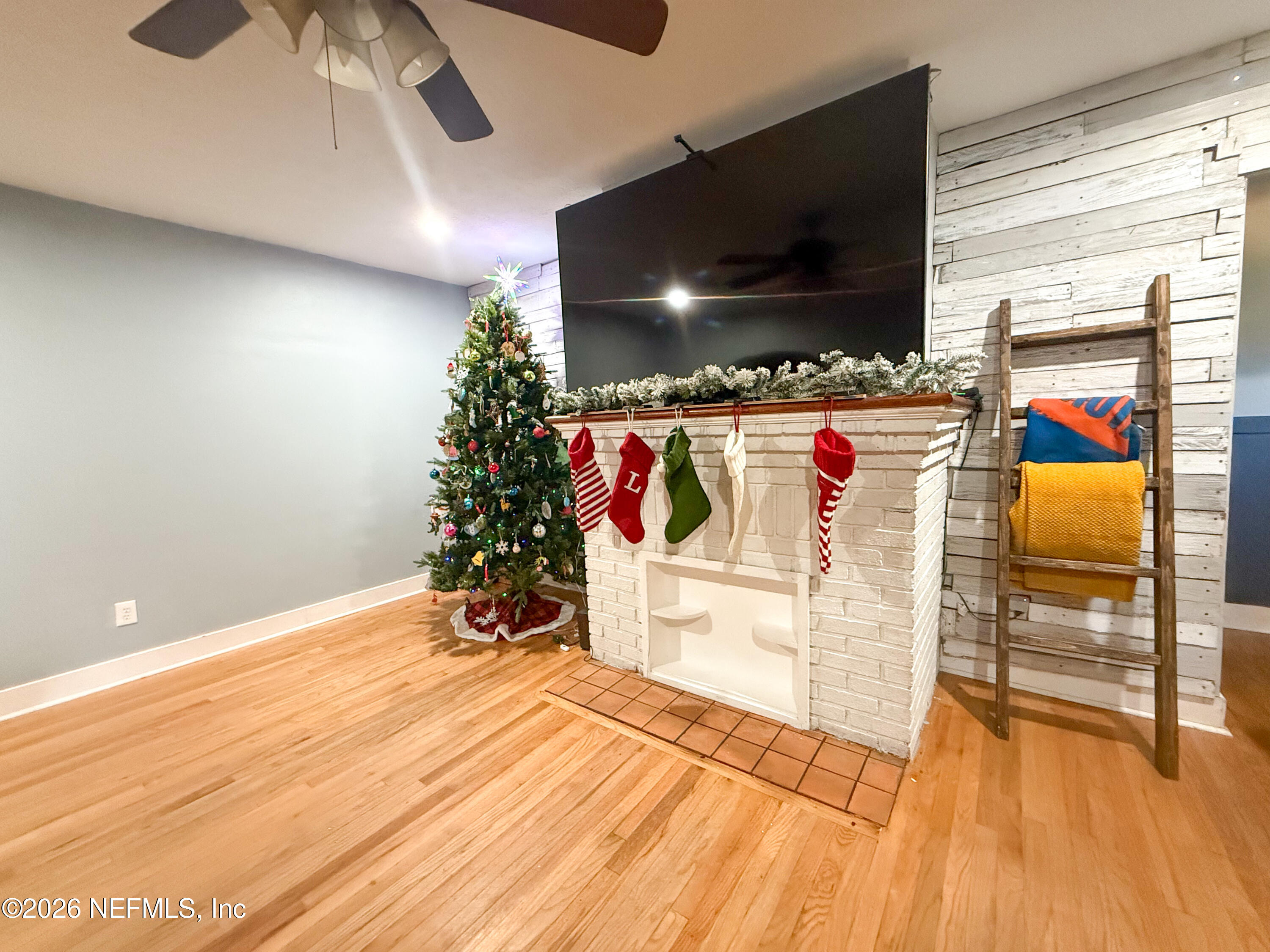 169 Center Street North Baldwin, FL 32234 - Photo 8 of 15 a view of water heater room with wooden floor