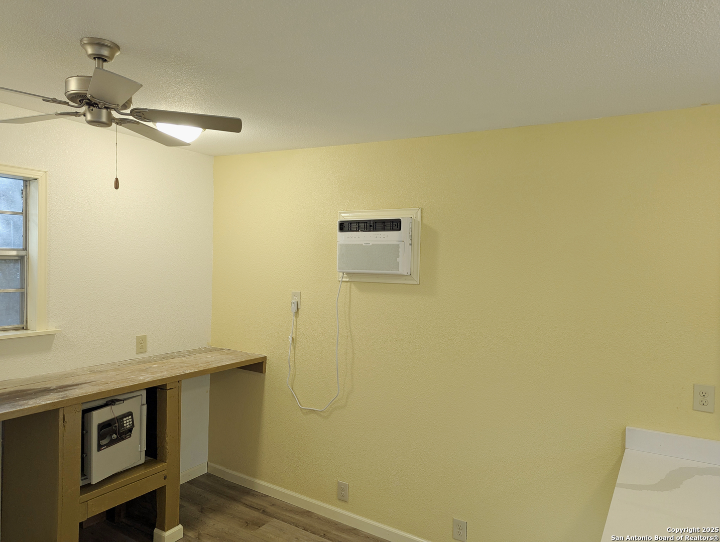 19517 Scenic Loop Road Helotes, TX 78023 - Photo 33 of 55 a bathroom with a sink and a mirror