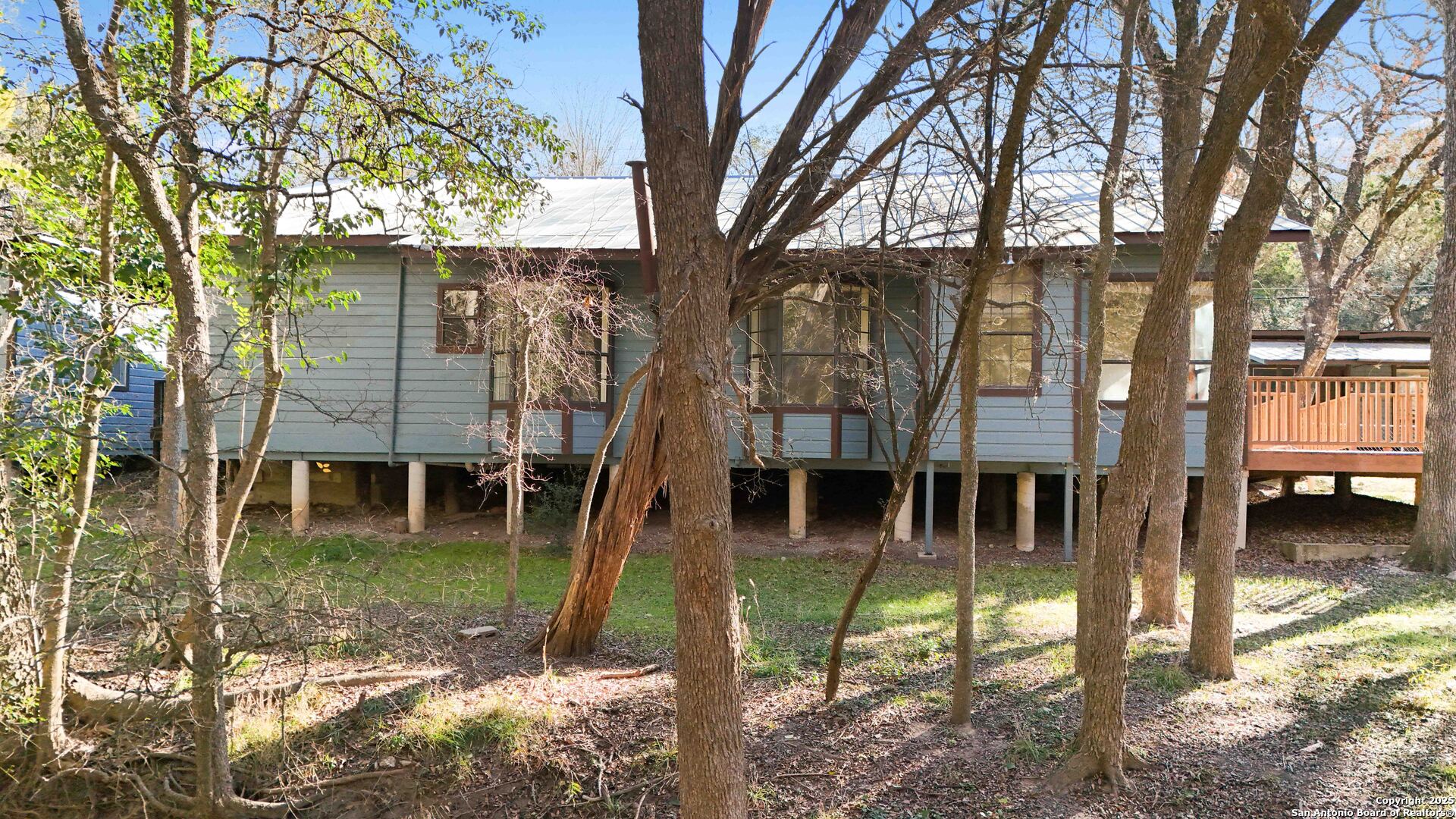 19517 Scenic Loop Road Helotes, TX 78023 - Photo 54 of 55 a backyard of a house with lots of green space
