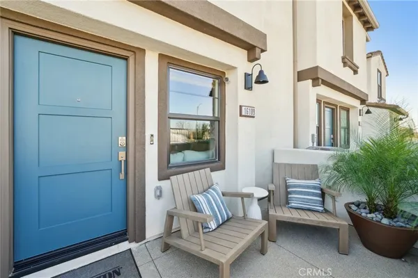 a view of a entryway with furniture and front door