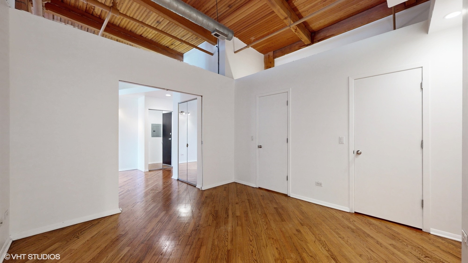 616 West Fulton Street, Unit 609 Chicago, IL 60661 - Photo 23 of 23 a view of a room with wooden floor