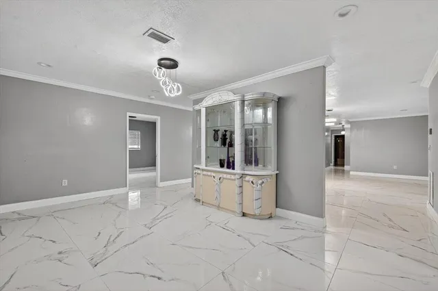 a large space with white doors