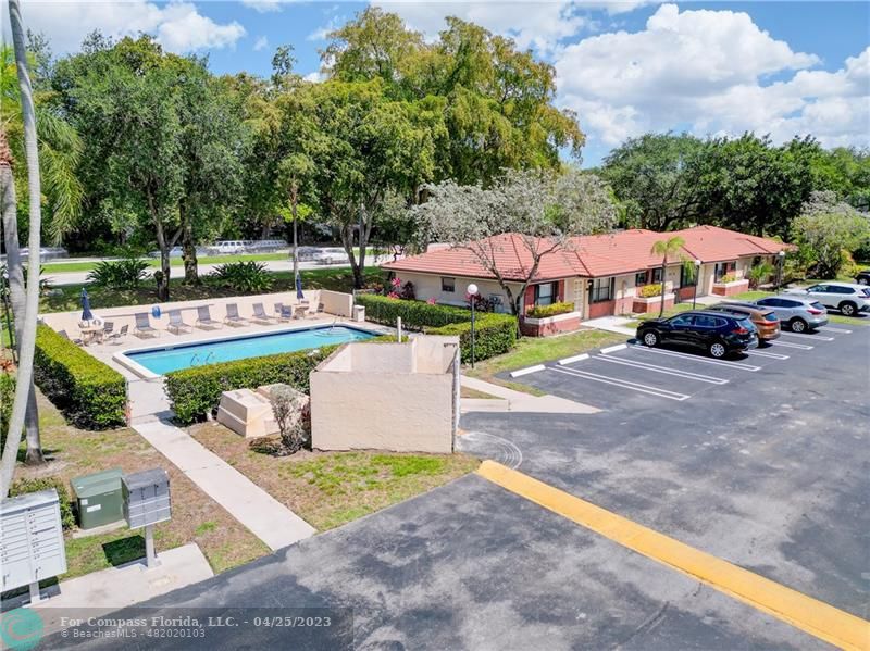 9649 Northwest 4th Street, Unit 5E Coral Springs, FL 33071 - Photo 21 of 30 an outdoor space with furniture and garden