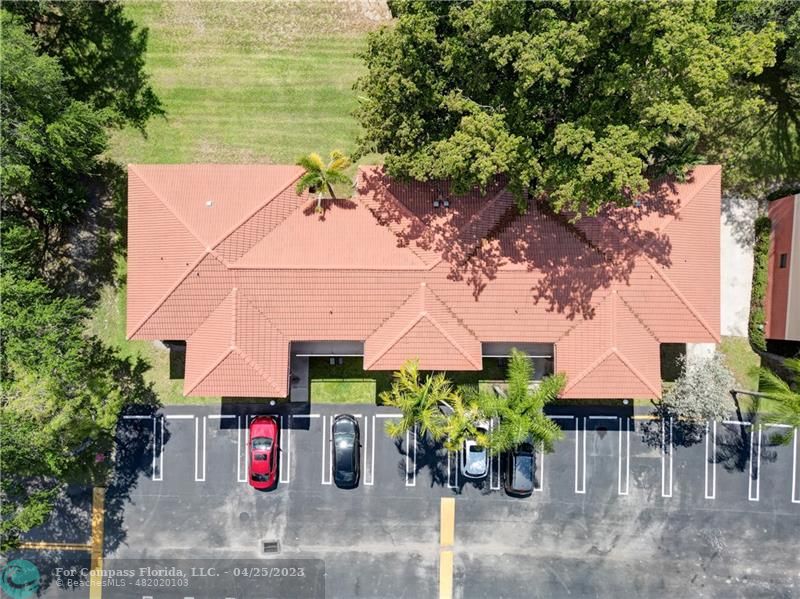 9649 Northwest 4th Street, Unit 5E Coral Springs, FL 33071 - Photo 22 of 30 an aerial view of a house with garden and sitting area