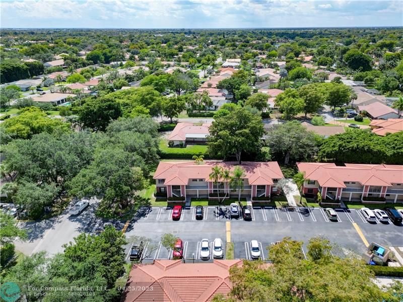 9649 Northwest 4th Street, Unit 5E Coral Springs, FL 33071 - Photo 23 of 30 an aerial view of house with yard