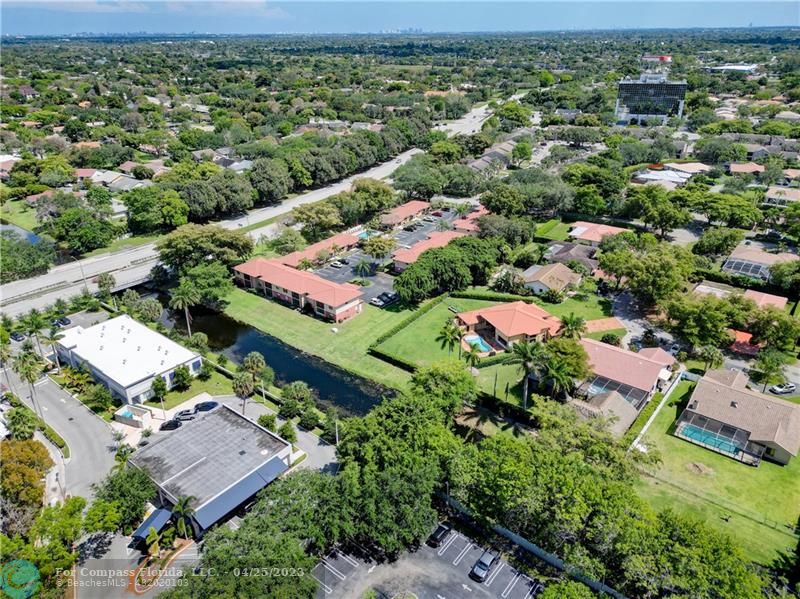 9649 Northwest 4th Street, Unit 5E Coral Springs, FL 33071 - Photo 26 of 30 an aerial view of residential houses with outdoor space