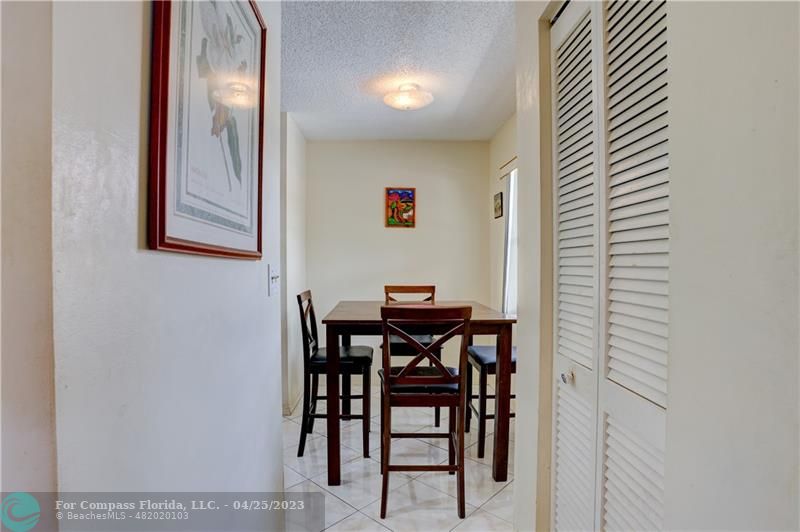 9649 Northwest 4th Street, Unit 5E Coral Springs, FL 33071 - Photo 6 of 30 a view of a dining room with furniture and window