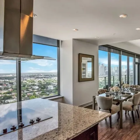 a very nice looking dining room with a table and chairs