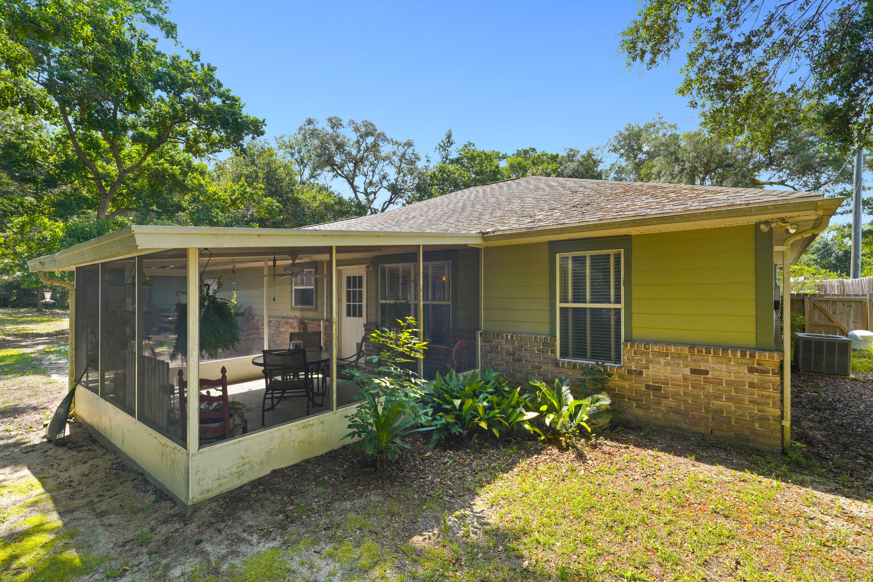 117 Will Street Freeport, FL 32439 - Photo 8 of 19 Florida Room Exterior View