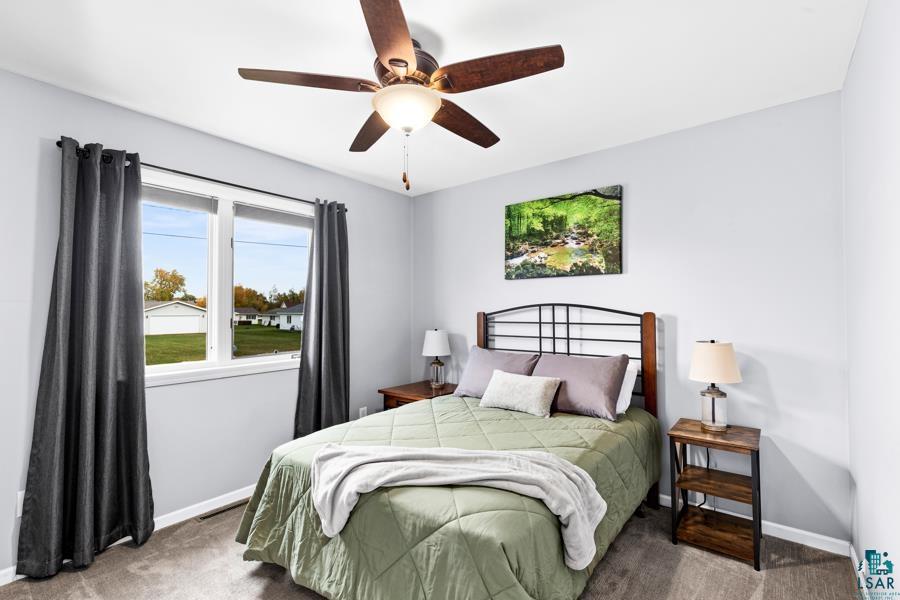 2020 East 11th Street Superior, WI 54880 - Photo 17 of 30 Carpeted bedroom with a ceiling fan and baseboards